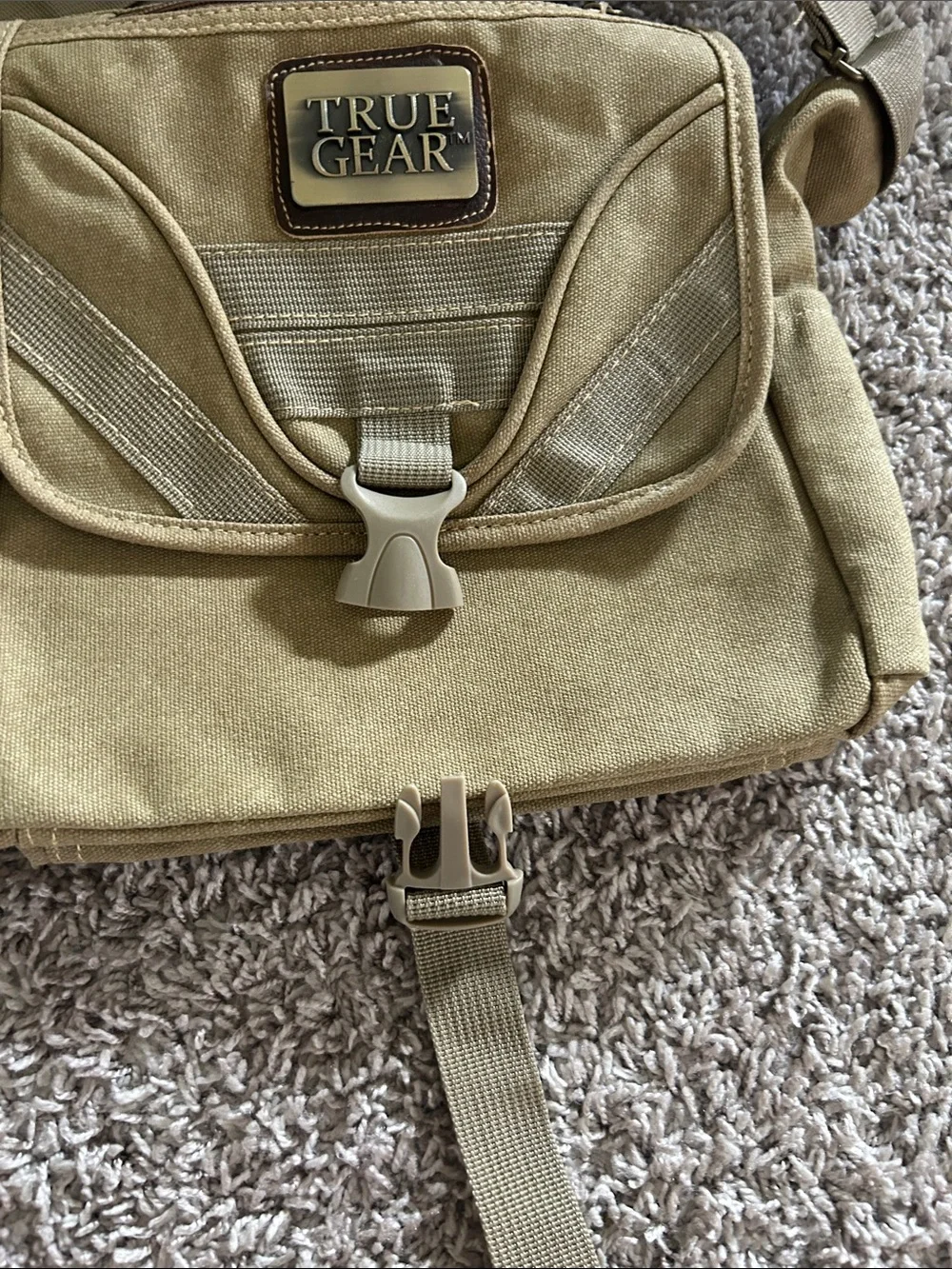 Tan/khaki  Messenger crossbody Bag with Adjustable Strap. Waterproof liner